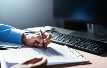Close-up view on desk office, businessman checking a contract of investment or insurance, legal agreement before sign, Starting successful partnership with entrepreneur or companie, making good deal