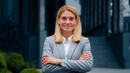 Caucasian woman walking outdoors successful confident businesswoman professional manager leader...