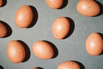 Eggs set. Many food protein. Brown on background. Hard shadow. Easter sun pattern. Color decorative paint art. Traditional cuisine top view. Flatlay
