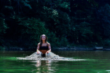 Photographs of model in water splashing having fun on a lake