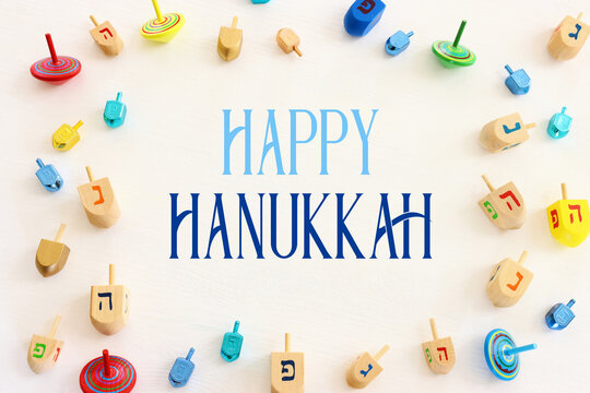 image of jewish holiday Hanukkah background of spinning tops