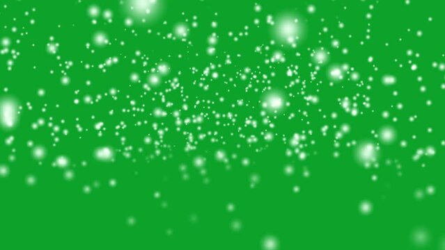 Snow falling down slowly 4K animation on Green screen. Christmas falling snow. Snowfall in holidays on chroma key background.