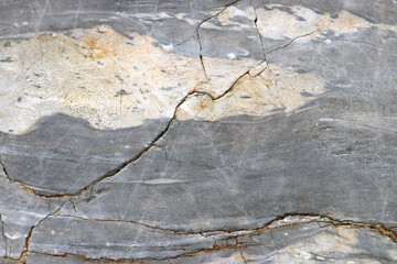 Background of raw stone texture with gray pattern.