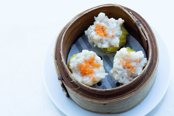 Chinese dim sum in a bamboo steamer