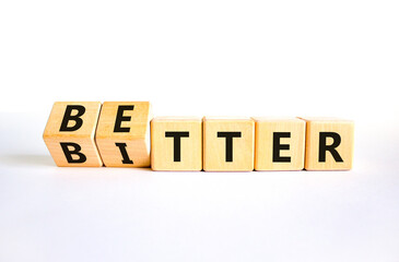 Better or bitter symbol. Concept word Better and Bitter on wooden cubes. Beautiful white table white background. Business and better or bitter concept. Copy space. - obrazy, fototapety, plakaty