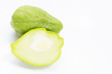 Fresh chayote fruit on white background.