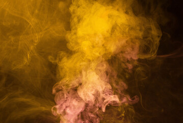 Yellow and pink steam on a black background.