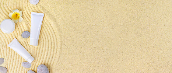 Cosmetics on the spa sea sand. Selective focus.