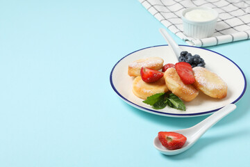 Concept of tasty sweet food, cheese pancakes, space for text