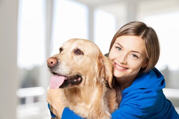 Young happy woman with cute pet