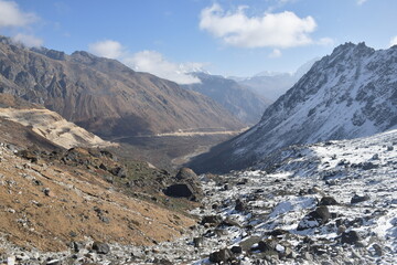 Panoramic landscape view of snowcapped Kala Patthar in sunny winter. It is a famous tourist attraction located in great Himalayas of Sikkim, India