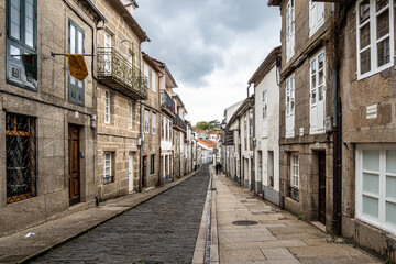 Hortas Street, Rua das Hortas is the first stage of Camino Finisterre at Santiago de Compostela, Galicia, Spain - obrazy, fototapety, plakaty