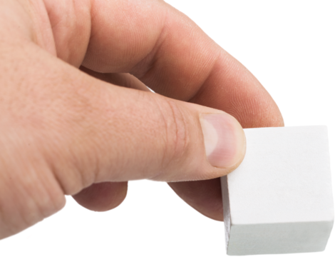 Hand arranging wood block stacking as symbol.