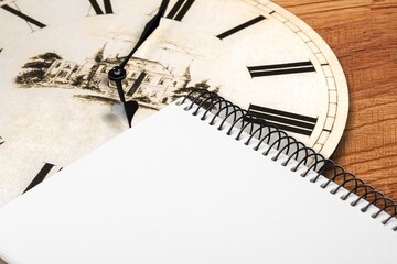 Office desk calendar and clock on the desk.