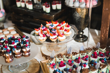 Delicious wedding reception candy bar dessert table