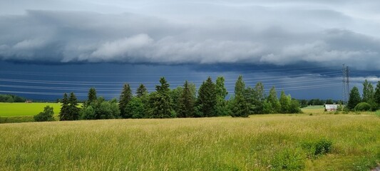 dark thunderclouds in a beautiful landscape