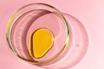 Yellow liquid in a petri dish