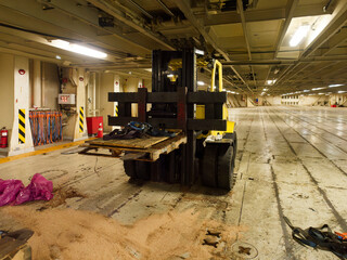 Fototapeta premium two tons fork lift inside a big roro ship