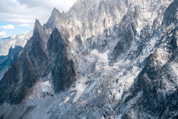 Spectacular mountain crags between glaciers in the alps.