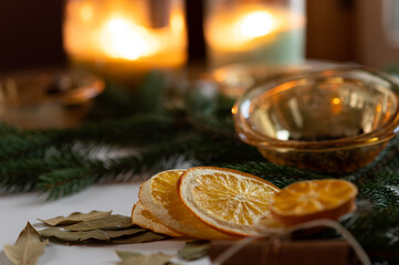 Citrus orange, lemon, lime slices, cinamon stick and pine. The makings of christmas garland to...