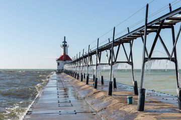 Obraz premium Lighthouse on the pier 