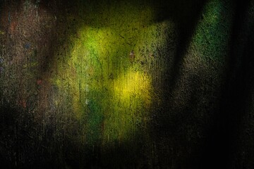 Illumination of a dark background with several light sources. Abstract texture wall