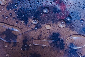 Water drops on glass. Raindrops were falling on the surface.