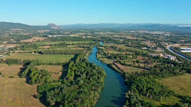 l'Argens river with fields around in south of France aerial shot 