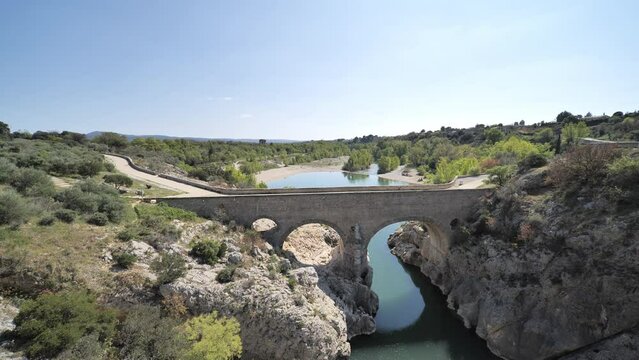 old bridge over the river le pont du diable Herault Occitanie France