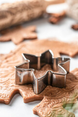 Making Christmas patterned gingerbread process, baking ingredients and dough. Xmas sweet, winter holidays concept, new year treet