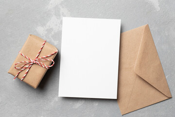 Greeting card mockup with envelope and gift box