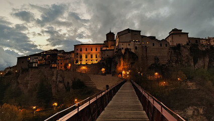 old town of Cuenca in Spain, from the bridge overlooking the medieval buildings of the city at...