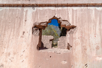 a house made of clay and red bricks in the countryside of Aregenina in the Andes mountains