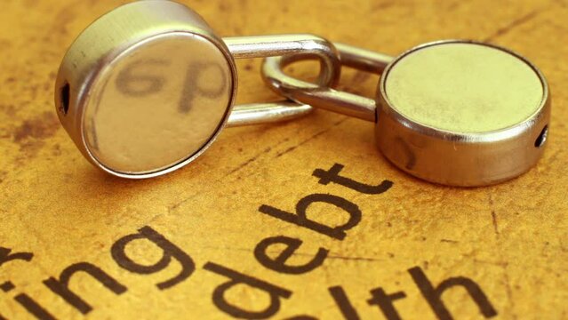 Locks on debt text dolly shot