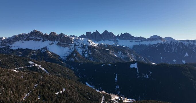 Epic Mountain range in South Tyrol, Italy. Snow covered forests and Geisler
