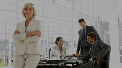 Animation of stock market data processing over caucasian senior businesswoman standing in office - Powered by Adobe