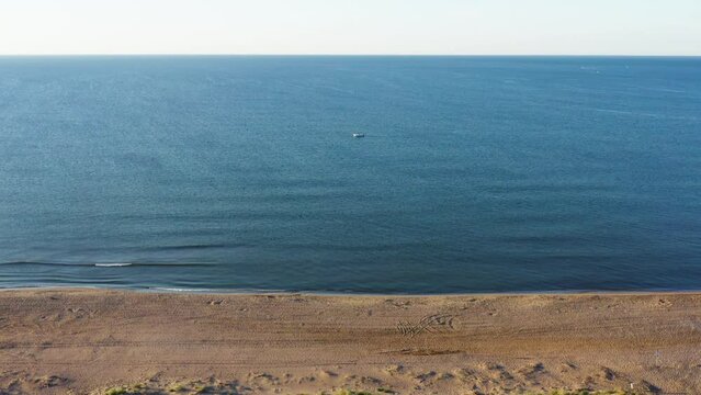 Little boat on the calm mediterranean sea along the beach aerial view Valras Plage 