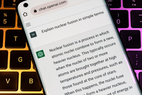 OPEN AI ChatGPT chat bot seen on smartphone placed on laptop. AI chatbot responded to the question about nuclear fusion. Stafford, United Kingdom, December 13, 2022.