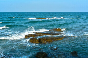 sea water sea view with water waves hitting rocks