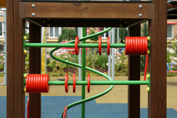Colourful abacus on outdoor playground in residential area