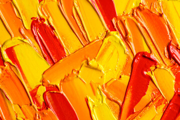 Beautiful strokes of colorful oil paints as background, closeup
