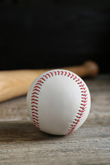 Baseball ball on wooden table. Sports equipment