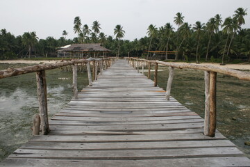 Fototapeta premium Wooden walkway at the beach