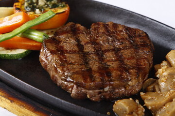 Closeup of tenderloin steak on a hot plate