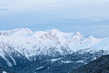 Fototapeta na wymiar Snowy mountains in Grandvalira in Andorra in winter