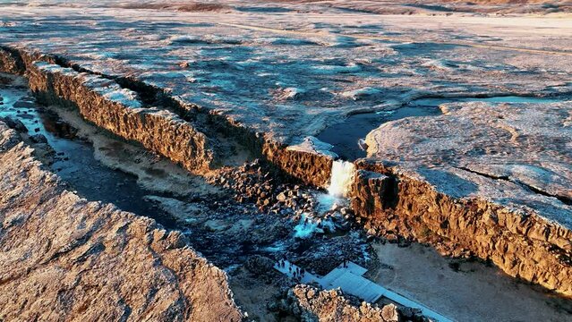 Aerial View Of Oxararfoss Waterfall In Thingvellir National Park, Iceland - drone shot