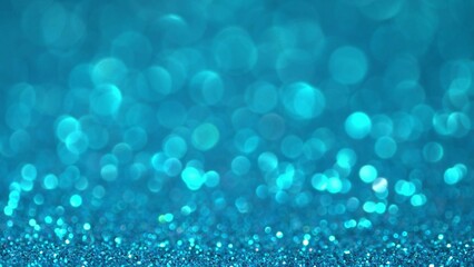 Blue Christmas background. Shiny blue surface rotates. Magic bokeh background