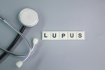 stethoscope with the word lupus. Healthcare conceptual for hospital, clinic and medical busines