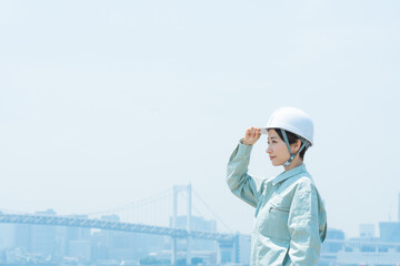 都会で働く作業員（作業服・作業着・スタッフ・建築・建設・仕事）