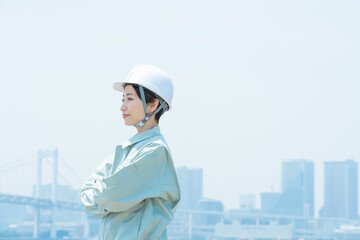 都会で働く作業員（作業服・作業着・スタッフ・建築・建設・仕事）